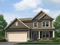 Charming two-story home featuring a covered porch, two-car garage, and manicured lawn at 62 Hampton Ter, Dallas, GA 30157