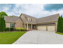 Traditional home featuring a lush front lawn, driveway and a two-car garage at 200 Glenview Ct, Woodstock, GA 30188