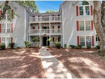 Inviting condo building with well-maintained landscaping and classic architecture at 219 Cobblestone Trl, Avondale Estates, GA 30002