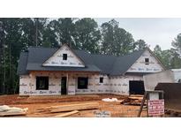 New construction home featuring a charming design with a covered front porch and a classic roofline at 620 Presley Farm Parkway Dr, Rockmart, GA 30153
