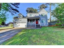 Charming two-story home with a well-manicured lawn and attached garage at 190 Grayland Creek Dr, Lawrenceville, GA 30046