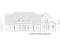 Stunning two-story home featuring dormer windows and a welcoming covered front porch at 2226 Upper Burris Rd, Canton, GA 30114