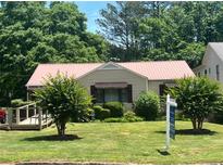 Charming single-story home with a well-maintained front yard and inviting curb appeal at 437 Eastland Dr, Decatur, GA 30030
