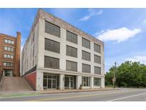 Commercial building with large windows, painted brick exterior, and street-level access on a clear day at 434 Marietta St Nw # 401, Atlanta, GA 30313