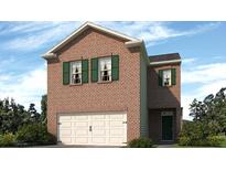 New two-story brick home featuring an attached two-car garage and green shutters at 3038 Manor Hill Pl, Union City, GA 30291