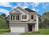 Charming two-story home featuring a brick and vinyl exterior with a two-car garage and neatly manicured lawn at 1095 Elowen Dr, Austell, GA 30168