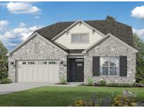 Beautiful single-Gathering home with gray brick, complemented by a lush lawn and charming landscaping at 2255 Windsor Bluffs Dr, Cumming, GA 30041