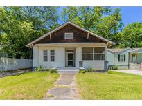 Charming single-story home with a inviting front yard and traditional architectural details at 3361 Myrtle St, Atlanta, GA 30354