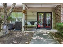 Charming front porch with seating and double doors at 2700 Pine Tree Rd # 3006, Atlanta, GA 30324