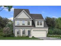 Charming two-story home showcasing stone and siding exterior, complemented by a well-manicured lawn at 2545 Dixon Pl, Lawrenceville, GA 30045