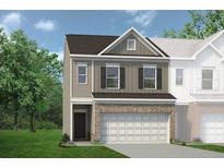 Charming two-story home featuring a brick-accented front and attached two-car garage at 84 Ravencliff Dr # 84, Austell, GA 30168