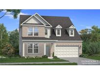 Charming two-story home with brick and gray siding, complemented by a well-manicured lawn at 2505 Dixon Pl, Lawrenceville, GA 30045