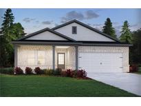 Charming single-story home with white brick, gray trim, lush landscaping, and a two-car garage at 3990 Brushy St, Powder Springs, GA 30127