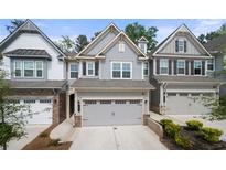 Charming townhomes featuring attached garages and well-maintained exteriors at 1025 Cherryfield Run, Marietta, GA 30008