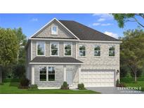 Charming two-story home featuring light brick, dormer window, and a welcoming two-car garage at 2525 Dixon Pl, Lawrenceville, GA 30045