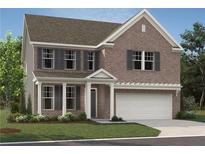 Charming two-story brick home featuring an attached two-car garage and a covered front porch at 5371 Heron Bay Blvd, Locust Grove, GA 30248