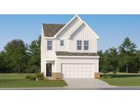 Charming two-story white home with a well-manicured lawn, integrated garage and a classic architectural design at 2464 Cotton Ln, Douglasville, GA 30135