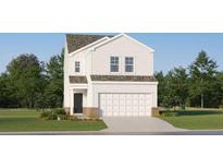 Charming two-story home with attached garage, landscaped lawn and a classic colonial facade at 2288 Linden Pass, Douglasville, GA 30135