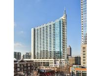 Stunning high-rise building with many windows and balconies against a clear blue sky at 860 Peachtree Street Northeast Ne St # 811, Atlanta, GA 30308