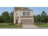 Charming two-story home with a two car garage and landscaped front yard at 2276 Linden Pass, Douglasville, GA 30135