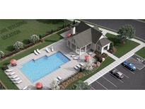 Community clubhouse with a large swimming pool, ample lounge chairs, and convenient parking spaces at 3336 Cranston Ln, Kennesaw, GA 30144