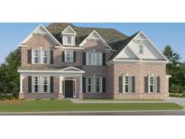 Charming two-story brick home with black shutters, manicured lawn, and inviting front porch at 416 Valley View Trl, Canton, GA 30115
