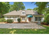 Charming traditional home with a well-manicured lawn, beautiful landscaping, and a classic facade at 2682 Varner Dr, Atlanta, GA 30345