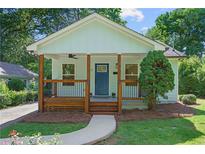 Charming home featuring a welcoming front porch with wooden posts and a well-manicured lawn at 5 Windsor Ter, Avondale Estates, GA 30002