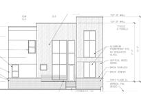 A modern multi-level house design featuring a combination of cementitious panels, wood siding, and aluminum windows at 1301 Lavista Ne Rd, Atlanta, GA 30324