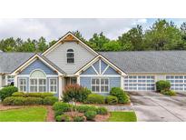 Charming single-Gathering home with well-manicured landscaping, attached garage, and beautiful curb appeal at 18 Mary Ne Ln, White, GA 30184