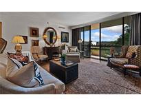 Bright living room featuring comfortable seating, a large window, and stylish decor at 2660 Peachtree Rd # 6A, Atlanta, GA 30305