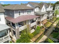 Beautiful exterior view of townhomes featuring covered patios and landscaped gardens at 914 Martin Nw St, Atlanta, GA 30315