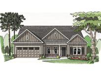Charming single-story home with a two-car garage, brick accents, and a well-manicured front lawn at 1024 Red Oak Blvd, Loganville, GA 30052