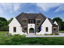 Striking two-story home featuring black and white accents, complemented by a lush green lawn at 7160 Shady Grove Rd, Cumming, GA 30041