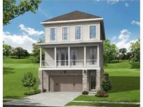 Two-story home featuring a brick facade, charming balcony, and neutral-toned siding at 657 Summit Hill Way, Cumming, GA 30040