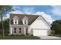 Charming two-story home with brick accents, white siding, dormer windows, and an attached two-car garage at 164 Henley St, Canton, GA 30114