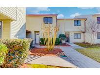 Charming townhouse with a well-maintained front yard and inviting entrance at 1144 Country Ct, Lawrenceville, GA 30044