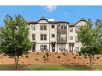 Stylish townhome boasts a modern design and inviting curb appeal at 1088 Battery Park Rd, Decatur, GA 30033