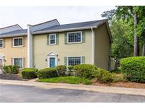 Charming two-story home with green shutters and a well-maintained lawn at 1701 Wiscasset Pl, Tucker, GA 30084