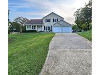 Charming two-story home with well maintained lawn and large driveway at 2752 Inverloch Cir, Duluth, GA 30096