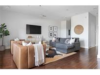 Inviting living room featuring hardwood floors, comfortable seating, and stylish decor at 1195 Milton Se Ter # 5101, Atlanta, GA 30315