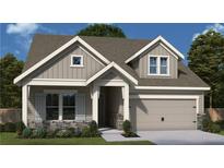 Charming single-story home featuring board and batten siding, stone accents, and an attached two-car garage at 207 Strawberry Lane, Woodstock, GA 30189