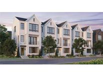 Modern townhomes with white brick, black trim, balconies, and professional landscaping at 2636 Mackintosh Ct # 15, Brookhaven, GA 30319