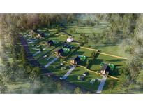 Stunning aerial view of modern homes with private pools in a lush, gated community surrounded by mature trees at 4340 River Rd, Ellenwood, GA 30294