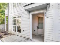 Inviting front entrance of a charming home with a white exterior and classic architectural details at 1250 Oxley Nw Ln, Atlanta, GA 30307