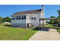 Charming home with a well-maintained yard and convenient carport at 7217 Union Grove Rd, Lithonia, GA 30058