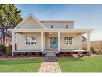 Charming home featuring a welcoming front porch, brick walkway, and well-manicured lawn at 3286 Bachelor Street, East Point, GA 30344