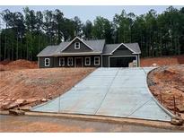 New construction with a modern gray color scheme and an extra-long driveway at 96 Lexie Ct, Rockmart, GA 30153