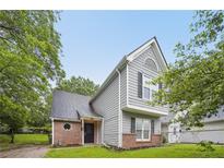 Charming two-story home features brick accents, a well-maintained lawn, and a classic architectural design at 484 Culberson Sw St, Atlanta, GA 30310