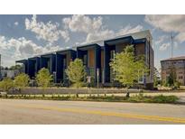 Modern townhome complex with striking dark blue exteriors and contemporary design elements at 816 Berne St # 6, Atlanta, GA 30316
